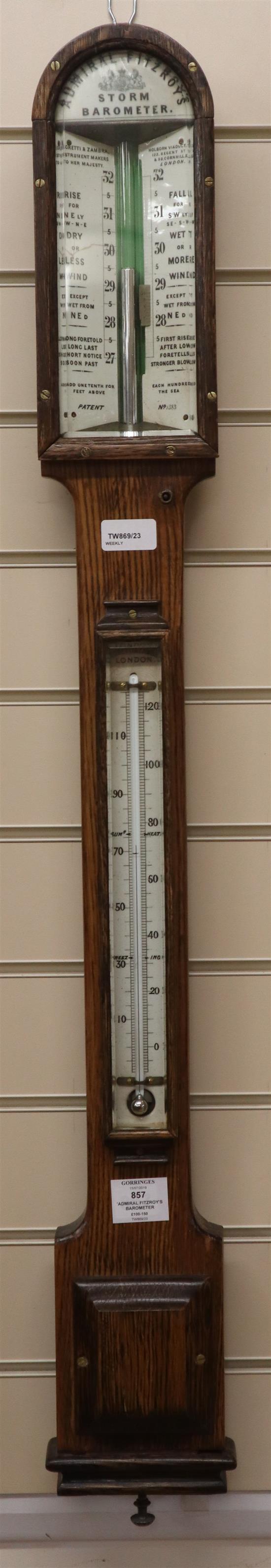 A Victorian Admiral Fitzroys Storm Barometer by Negretti & Zambra, Holborn Viaduct…London, having ivory scales and arched oak case H